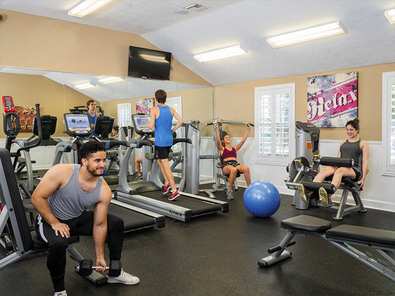 Residents exercising in the fitness center