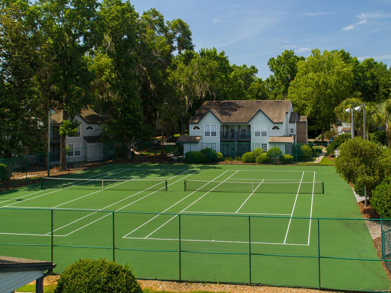 Large tennis court with two nets